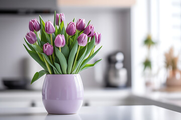 flowers in a beautiful modern ceramic vase in a home interior