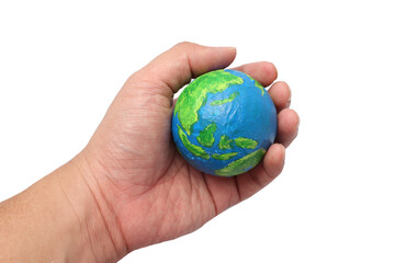 Painted planet earth globe hold in hand, cut out isolated