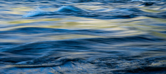 Glossy Surface of Fast Moving Waters in Merced River