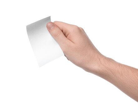 Man holding piece of blank thermal paper for receipt on white background, closeup