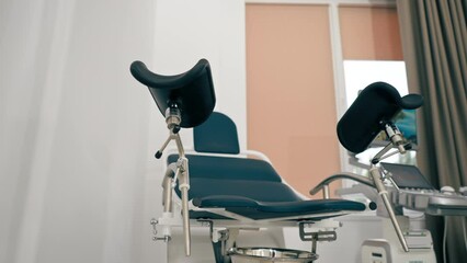 Gynecological chair with a screen in the medical office of the antenatal clinic in private clinic