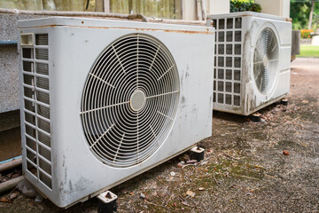 Old rusty air conditioner outdoor unit (CDU).