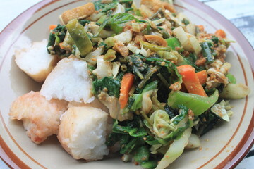 Indonesian food called lotek are on the table