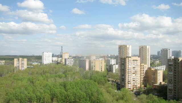 District of a modern city in the afternoon, the sky clouds run