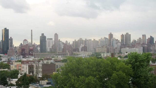 Manhattan from Queens at day, summer. Time lapse.