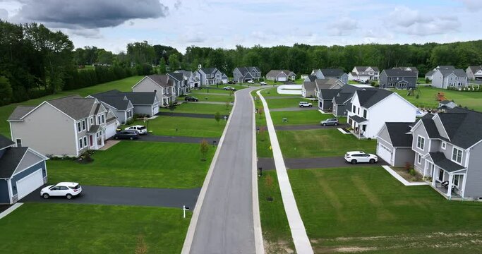 Top view of expensive two story private houses in Rochester NY suburbia. New family homes in upscale community. Real estate development in American suburbs