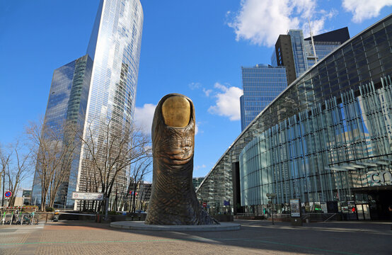 View at The Thumb - bronze sculpture of Cesar Baldaccini in La Defense district - Paris, France