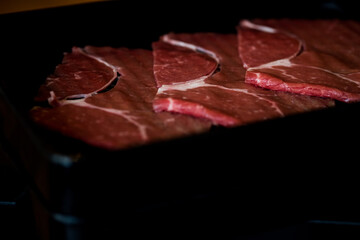 Close up of raw meat in black tray for yakiniku Japanese style