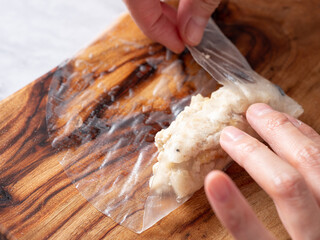 Wrap the chopped vegetables and shrimp in rice paper.