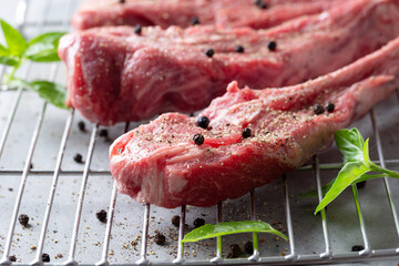 Fresh lamb ribs on a grill plate