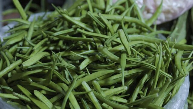 Cyamopsis tetragonoloba,guar or cluster bean at vegetable store for sale at evening