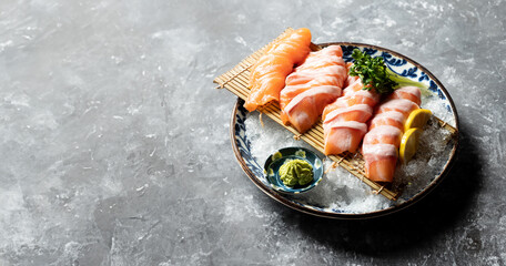 Raw salmon sashimi on a plate
