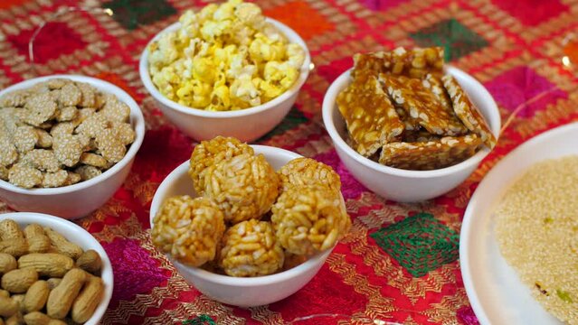Indian festival food snack sweet for Lohri Makar Sankranti  Pongal. Diwali  harvest festival  Tamil Nadu  winter folk festival  Punjab  North India.. Beautifully plated homemade sweets consumed dur...