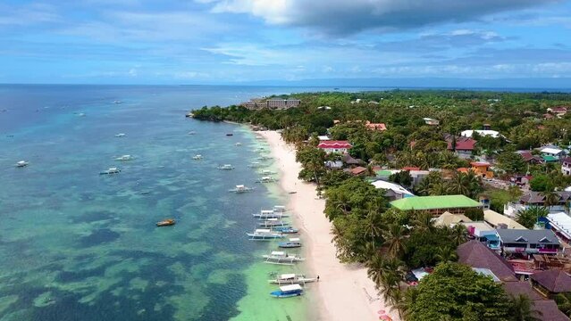 Scenic Aerial Panorama Drone Video of the White Sand Beach of Alona Bach in Panglao, Bohol,. Philippines