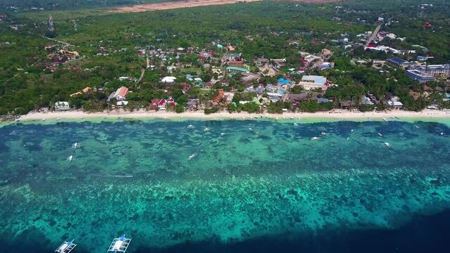 Scenic Aerial Panorama Drone Video of the White Sand Beach of Alona Bach in Panglao, Bohol,. Philippines