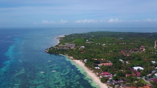 Scenic Aerial Panorama Drone Video of the White Sand Beach of Alona Bach in Panglao, Bohol,. Philippines