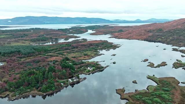 Drone landscape flying over inlet from the sea on The Ring Of Kerry on The Wild Atlantic Way Autumn morning in Ireland