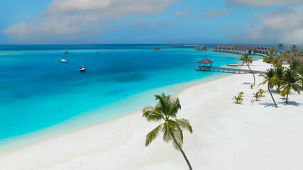 Summer palm tree  as white sand Tropical beach  in maldives paradise scenery seascape with water...