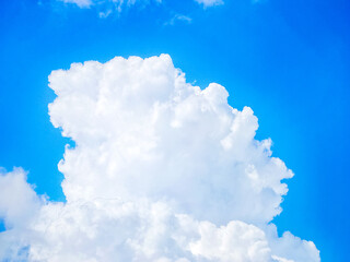 Naklejka na ściany i meble Blue sky background with clouds. Bright sky and clouds of the day. Long holiday, background for relaxation mood Relaxation.