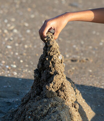 Sand towers on the seashore