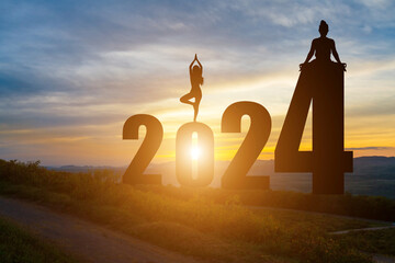 Happy New Year Numbers 2024, Silhouette woman practicing yoga early morning sunrise over the...