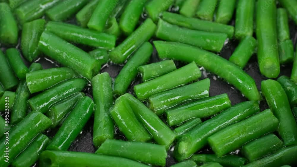 Wall mural cooking in frying pan green beans. healthy vegan food concept