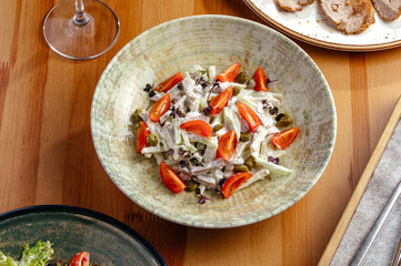 salad with vegetables and beef in cream sauce