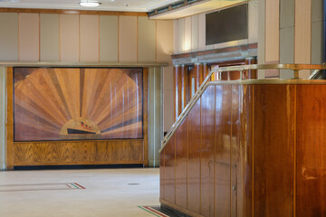 Impressive Artdeco Art Deco main atrium lobby staircase with grand stairs and chandelier on classic...