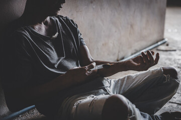  The concept of people addicted to drugs and against the use of illegal drugs. Drugs addiction and withdrawal symptoms concept. drugsInternational Day against Drug Abuse. - obrazy, fototapety, plakaty