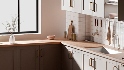 A bright beige-toned kitchen interior with sunlight 
coming through the window.