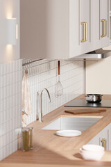 A bright beige-toned kitchen interior with sunlight 
coming through the window.
