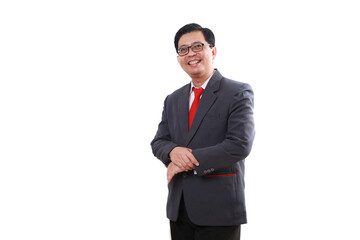 Happy asian businessman standing while looking at the camera. Isolated on white