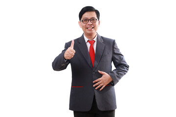 Happy satisfied asian businessman standing while showing thumbs up. Isolated on white