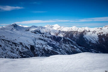 Fototapeta na wymiar Ski slopes and mountains of Les Menuires in the french alps