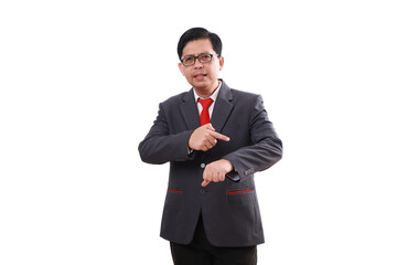 Angry asian businessman standing while pointing his wrist watch. Isolated on white background