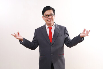 Asian businessman standing with yoga hand gesture. Isolated on white background