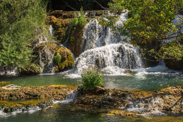 Fototapeta na wymiar Milancev Buk waterfall at Martin Brod in Una-Sana Canton, Federation of Bosnia and Herzegovina. Located within the Una National Park, it is also known as Veliki Buk or Martinbrodski