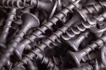 Bolts, screws - oxidized, plated, a pile of assortment for domestic work.