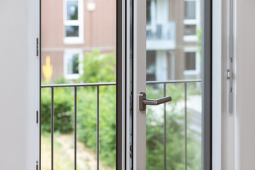 French Balcony Doors. Aluminum Window. Metal pvc Balcony Door Frame Open Closeup view. Energy efficient, Safety, Security.