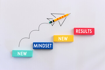 top view image of pencils with puzzle and the text new mindset. success and personal development...