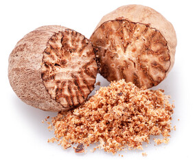 Nutmeg and ground nutmeg heap isolated on white background.