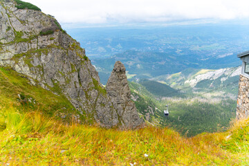 Fototapeta premium cable car lifting you mountains to the top of Kasprowy Wierch Poland