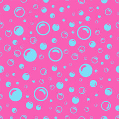 light blue soap bubbles on a pink background