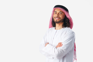 Portrait of a young Arab man wearing middle-eastern traditional dress thobe isolated on white