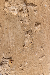 damaged red bricks from the wall of an ancient building