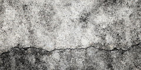 Fototapeta premium Fractured concrete wall or floor. Damaged wall background. Gray grunge cement surface with large cracks