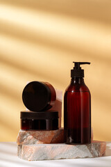 Cosmetic package dispenser with granite stone studio shot