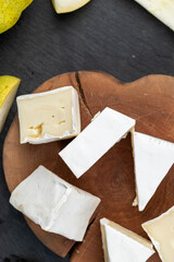 cheese with white mold cut into chunks