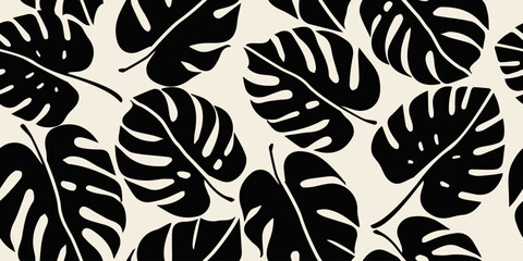 Monstera leaf seamless pattern. Hand drawn tropical leaves. Modern print in black and white color. natural ornaments for textile, fabric, wallpaper, home decor, background. © Udomdech