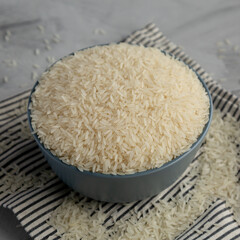 Dry Jasmine Rice in a Bowl, side view.